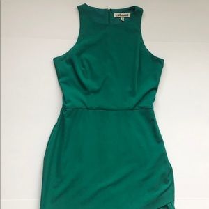 Green dress. Asymmetric bottom.